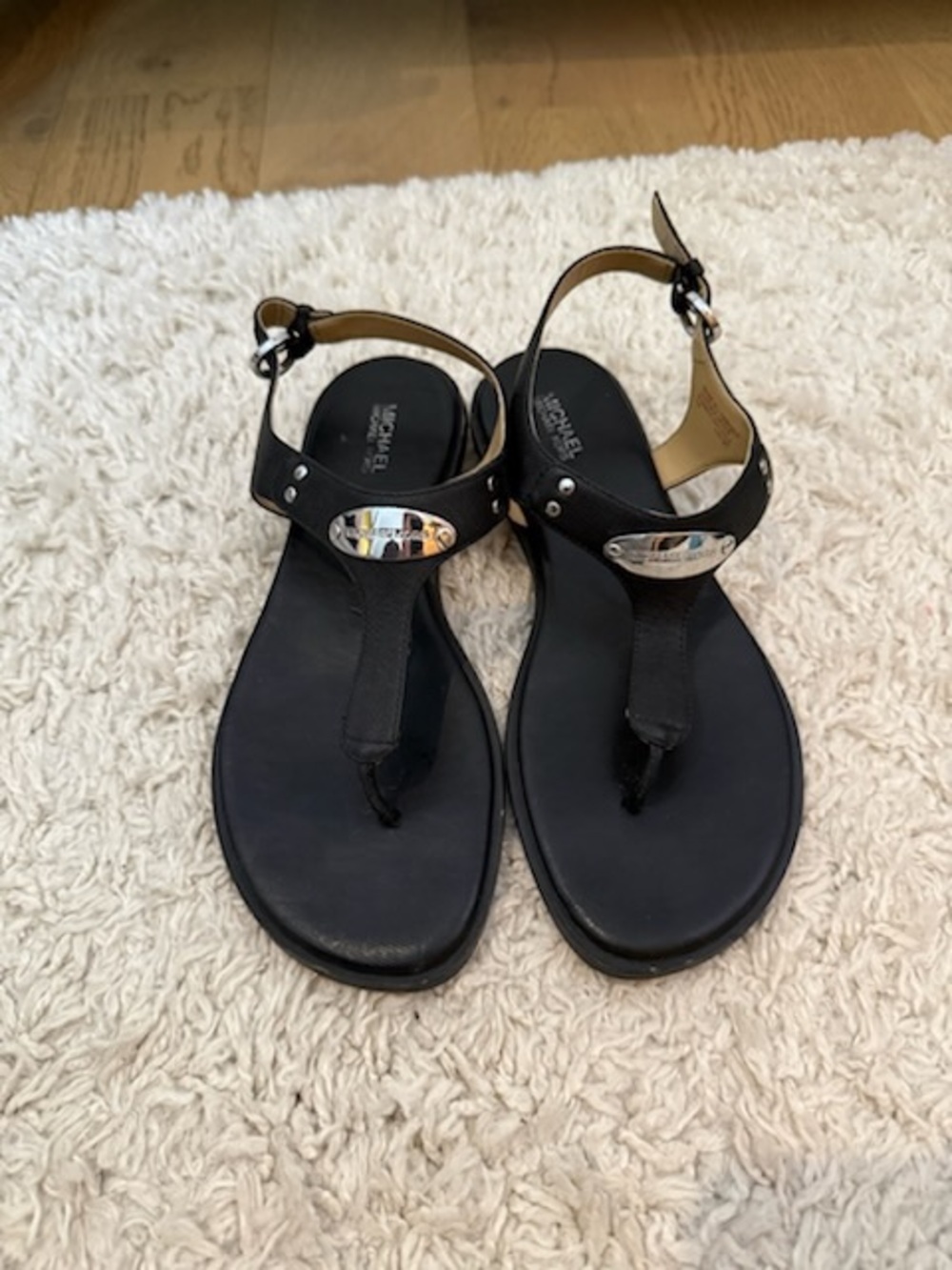 Michael Kors Black Thong Sandals with Silver Accent